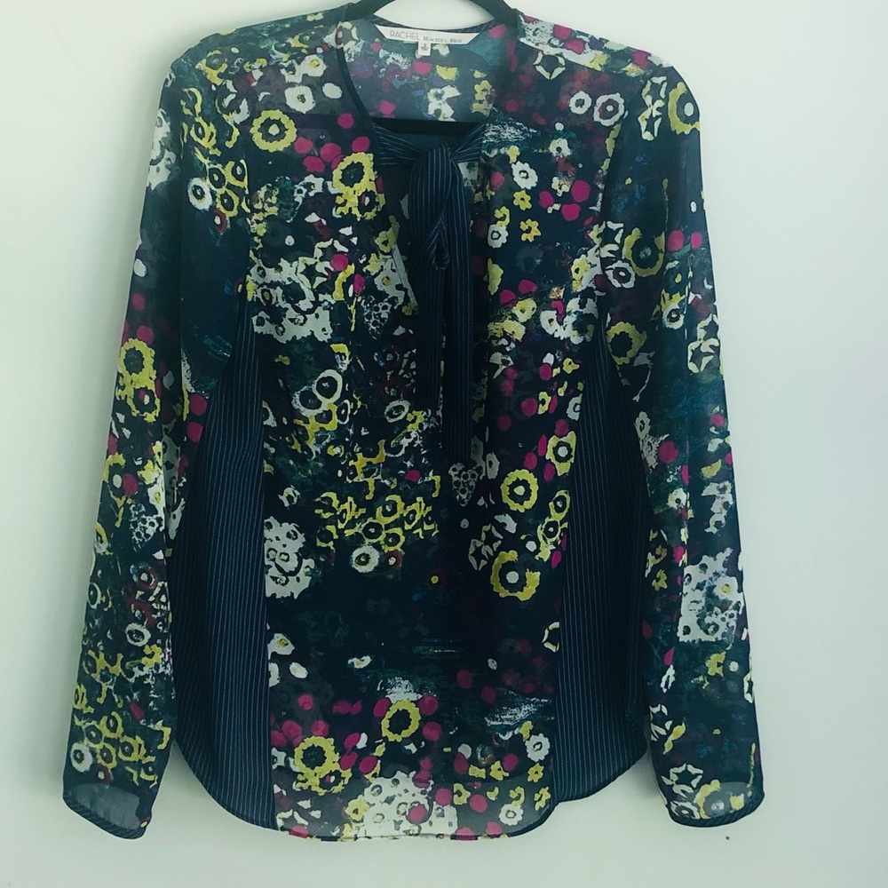 Rachel Roy sheer abstract design blouse.